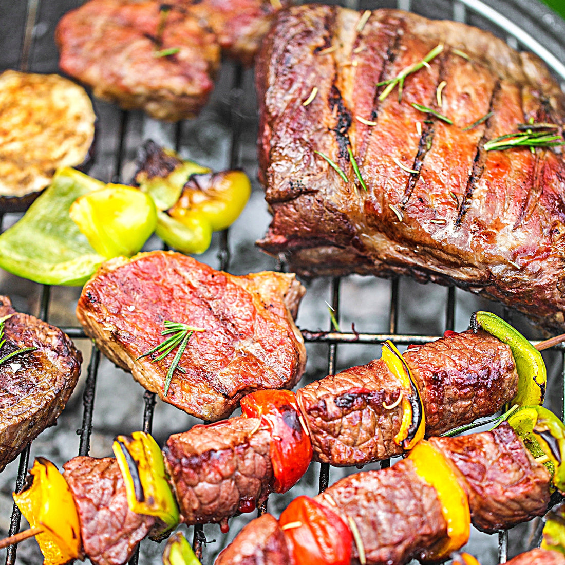 Close up view of different cbd meats on bbq grill