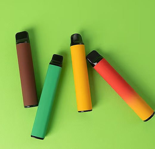 Disposable vape on a green background